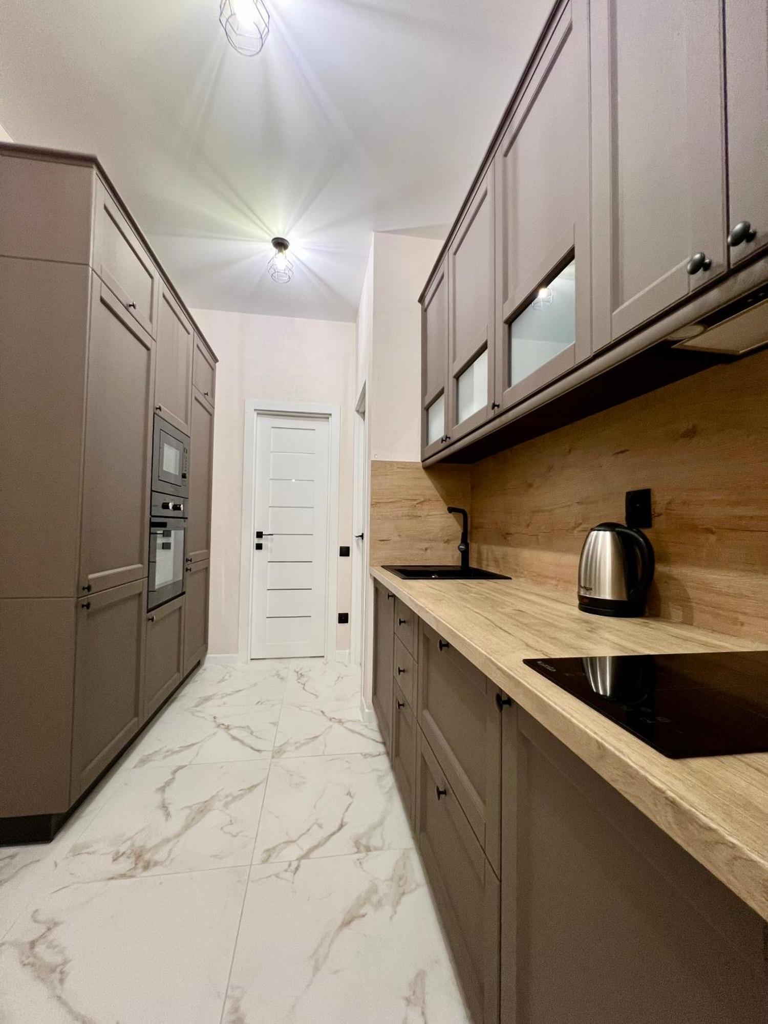 просторный люкс с 2-мя спальнями в центре,спасская 50 Apartment